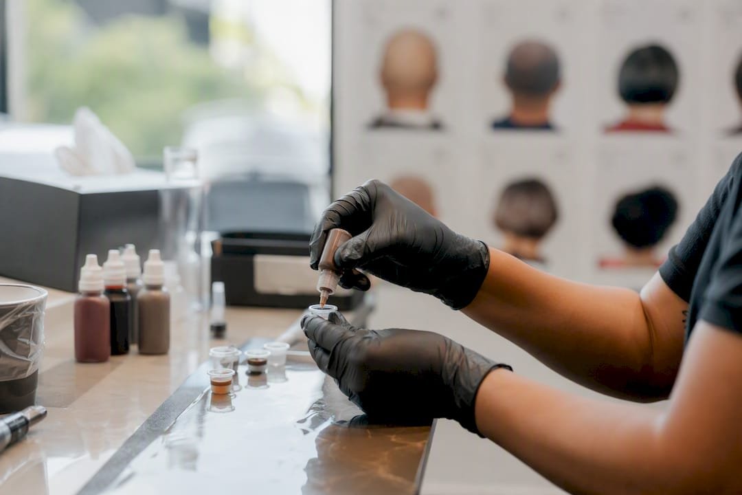 Technician mixing SMP color pigments